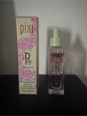 Pixi Rose Essence Oil in Pink and Green Packaging
